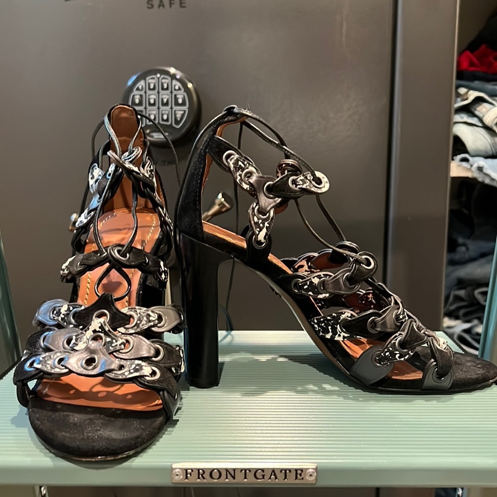 Coach strappy high heels size 5.5; black suede detail; leather upper.